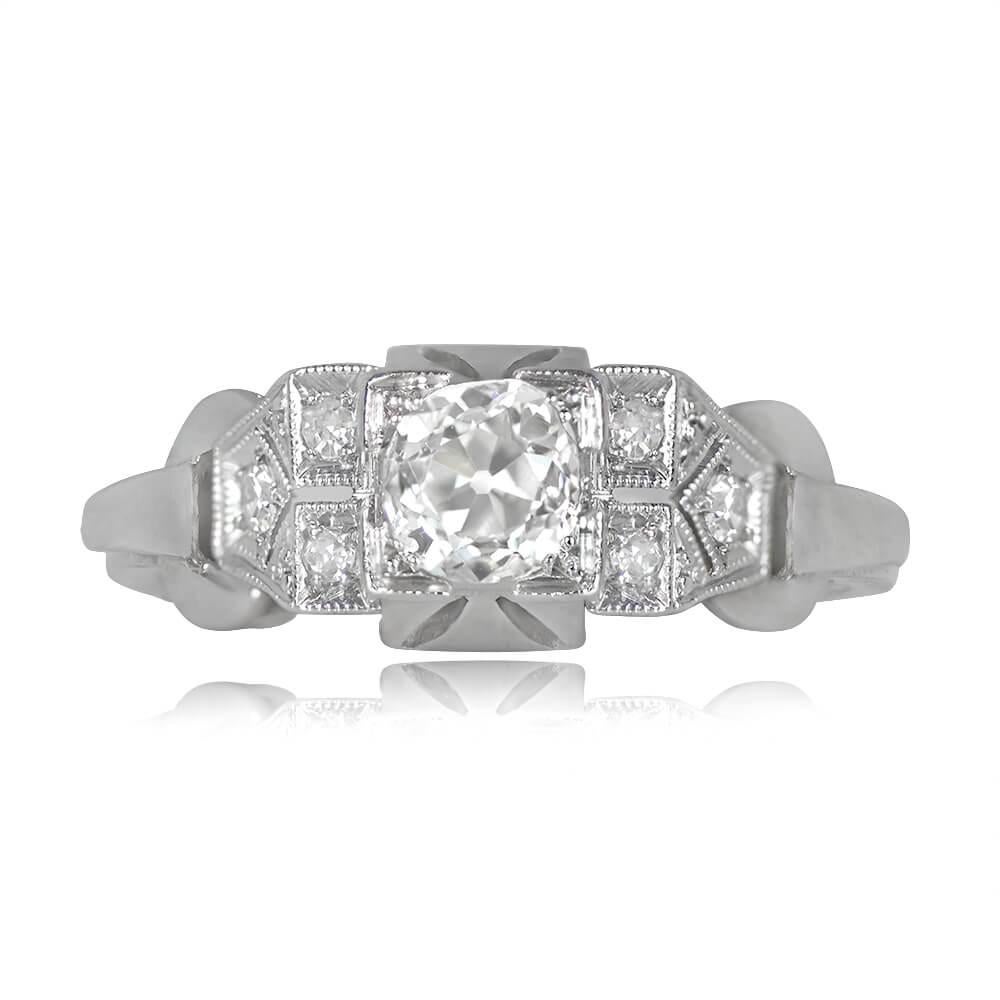 Vintage Engagement Ring: This captivating piece features a 0.55-carat old mine-cut diamond at its heart, boasting I color and SI1 clarity. The center diamond is securely set within box prongs. Delicate single-cut diamonds embellish the shoulders,