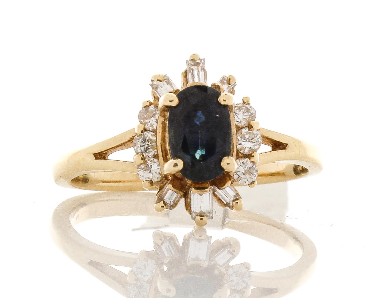 Vintage 0.59 Carat Oval Sapphire and Diamond Ring in 14 Karat Yellow Gold In New Condition In Chicago, IL