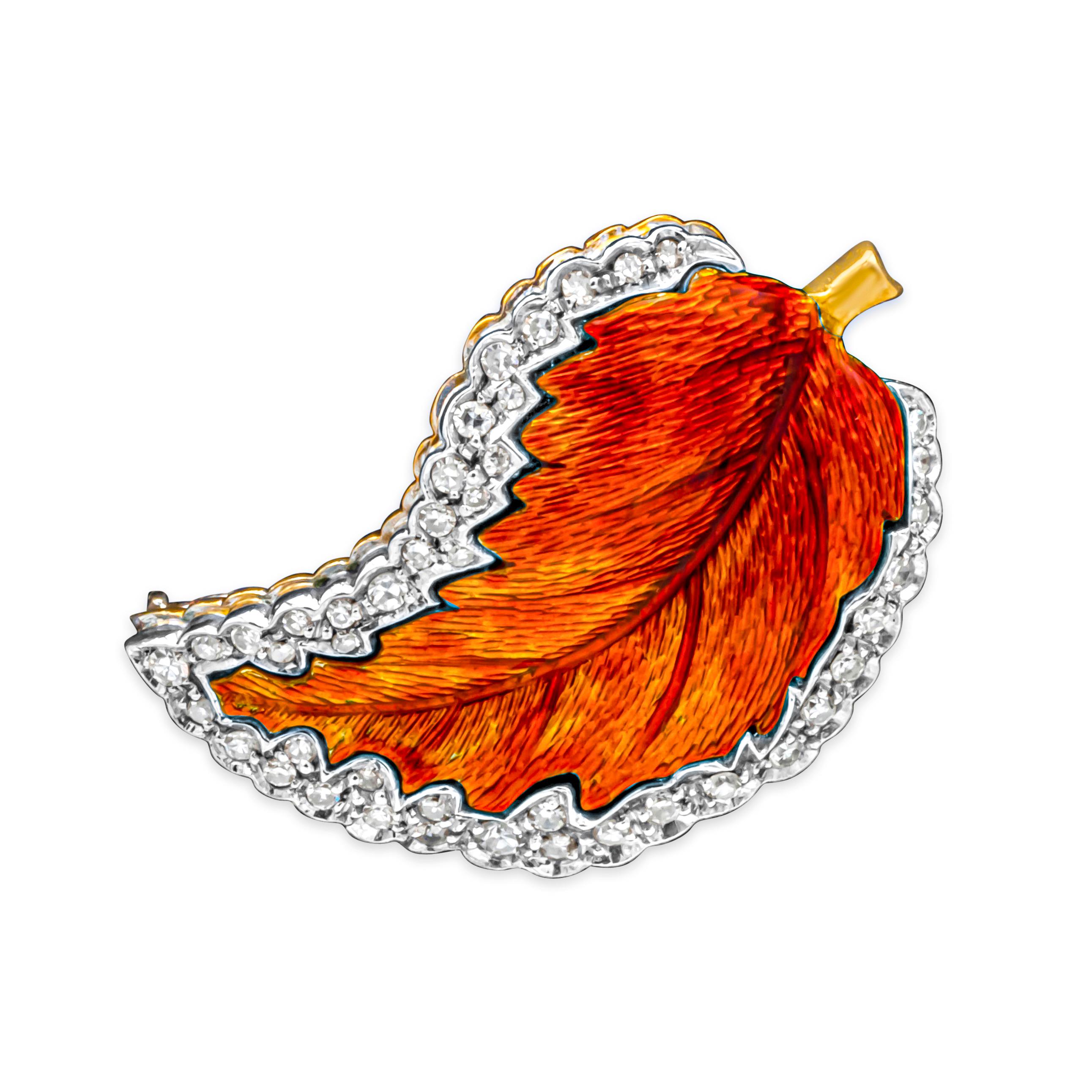 Showcasing a vintage and beautiful brooch set in a red enamel leaf-like design and surrounded by 44 brilliant round diamonds weighing 0.60 carats total, F-G color and VS-SI in clarity. Perfectly made in 18k yellow gold and platinum.

Style available