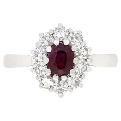 Anillo vintage de racimo de rubíes y diamantes de 0,60 ct, con matrícula de 1973