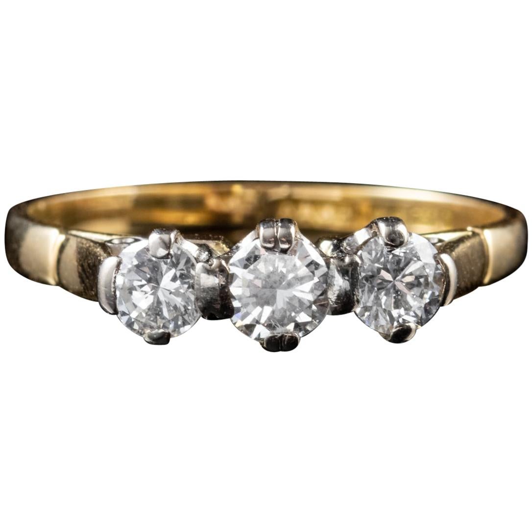 Vintage 0.65 Carat Diamond Trilogy Engagement Ring 18 Carat Gold Dated 1987 For Sale