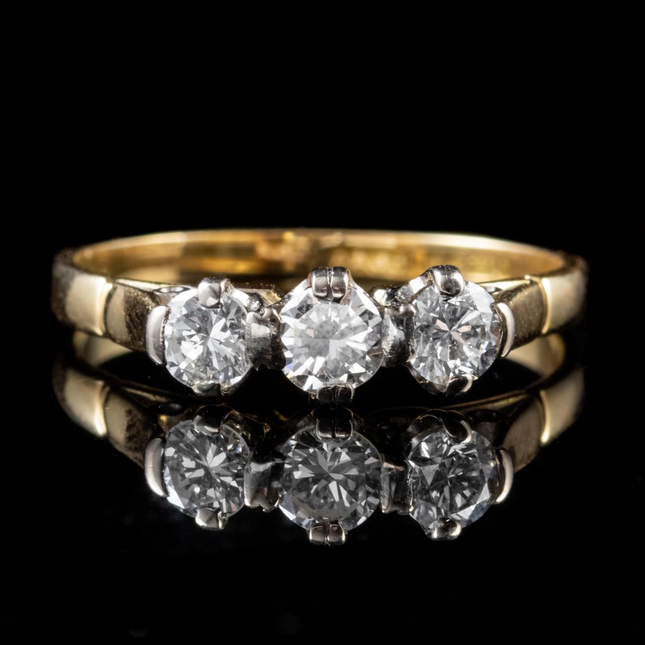 This beautiful Vintage Edwardian inspired ring has been commissioned in 18ct Yellow Gold with an 18ct White Gold gallery. The gallery is set with a trilogy of gorgeous brilliant cut Diamonds, the central of which weighs 0.25ct with the two Diamonds