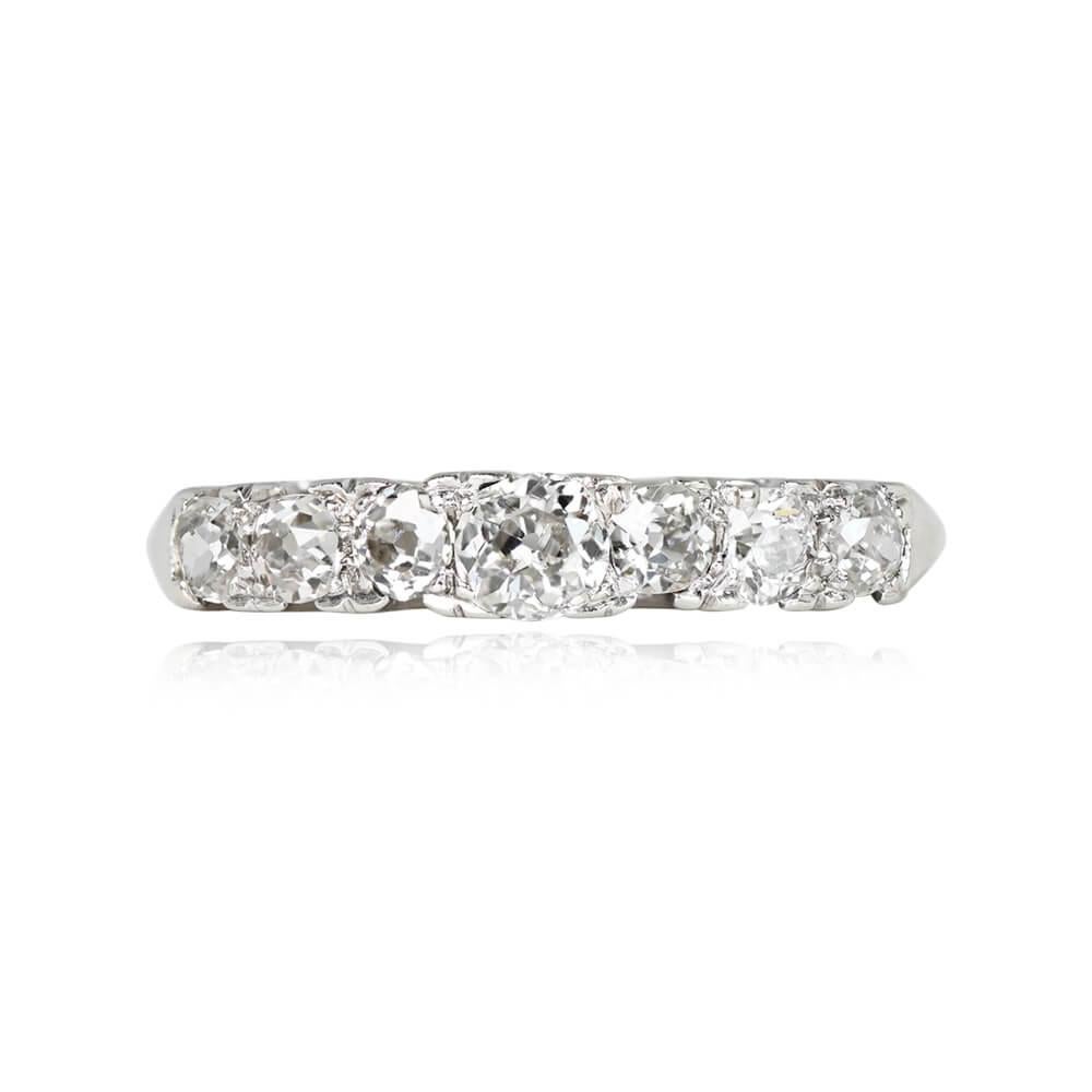 A vintage ring adorned with seven old mine-cut diamonds, totaling approximately 0.65 carats. The diamonds display I color and VS2-SI1 clarity. Crafted during the Art Deco era around 1930, this exquisite piece is made of 14k white gold.


Ring Size: