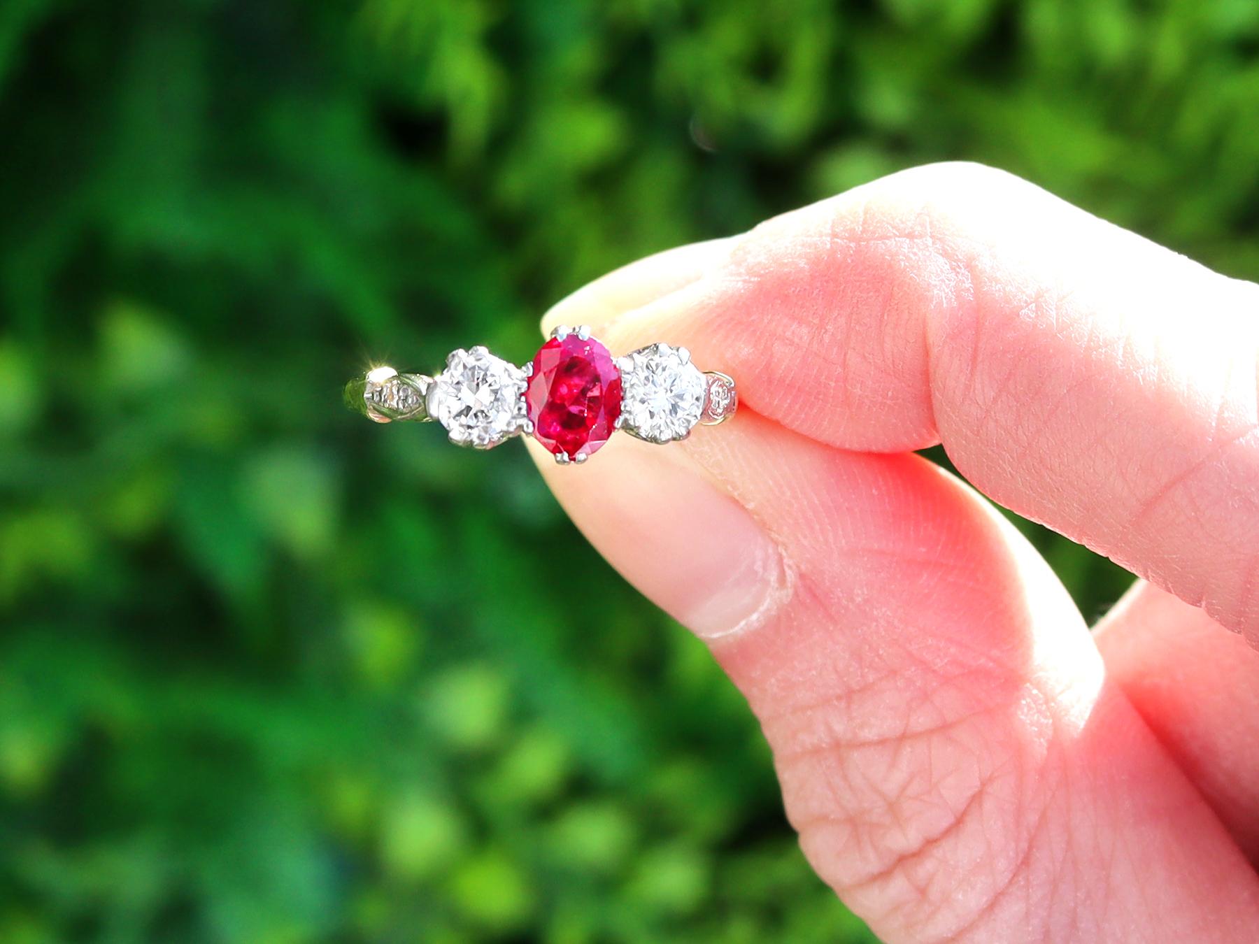 A fine and impressive vintage 0.66 carat ruby and 0.40 carat diamond, 18 karat yellow gold, white gold set, three stone/trilogy ring; an addition to our vintage jewellery and estate jewelry collections.

This fine and impressive trilogy ring has