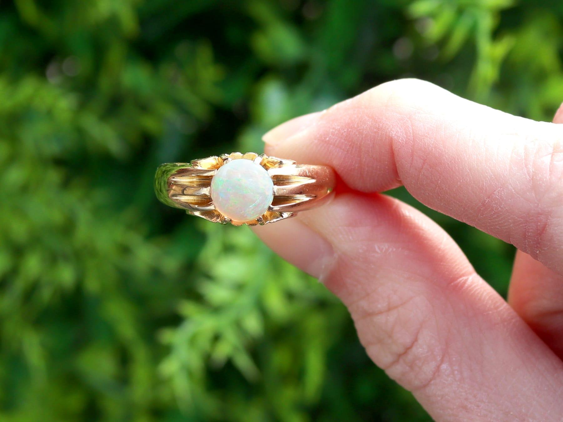 A fine and impressive vintage 1960s 0.68 carat opal and 18 karat yellow gold ring; part of our diverse collection of vintage gents jewelry collection.

This fine and impressive vintage opal ring has been crafted in 18k yellow gold, in the antique