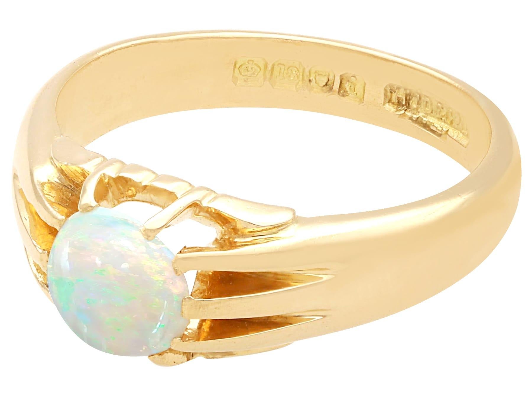 Cabochon Vintage 0.68 Carat Opal and 18 Karat Yellow Gold Ring For Sale