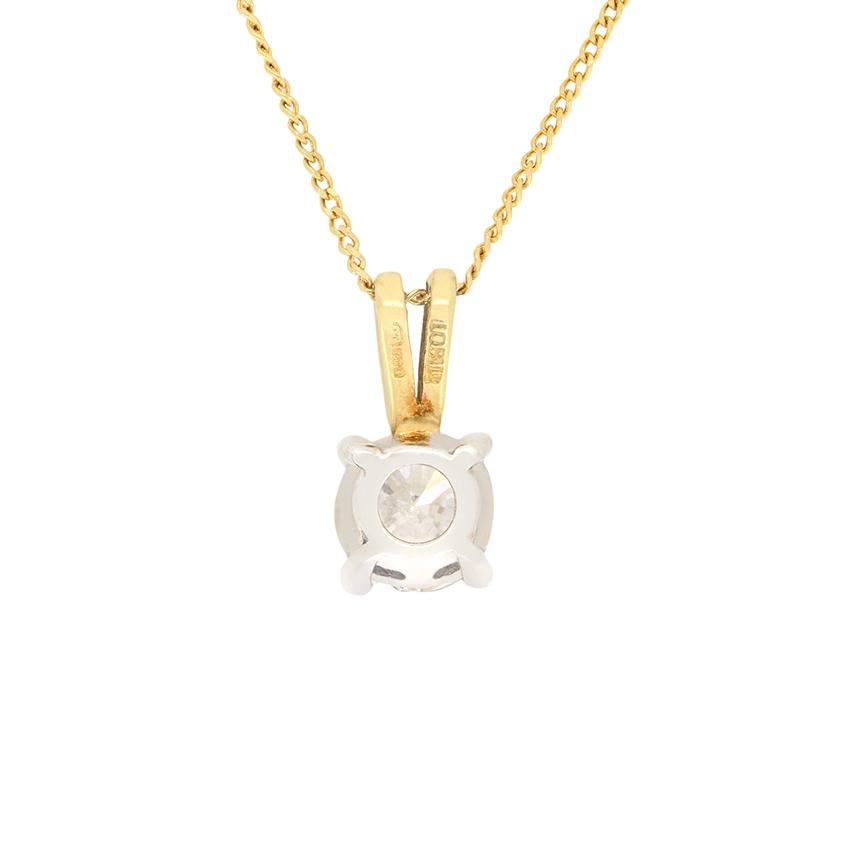 A super classy pendant set with a round brilliant cut diamond weighing 0.68 carat. It is of great quality, being F in colour and SI2 in clarity. This vintage pendant is composed of an 18ct white gold collet, where the diamond is claw set, with the