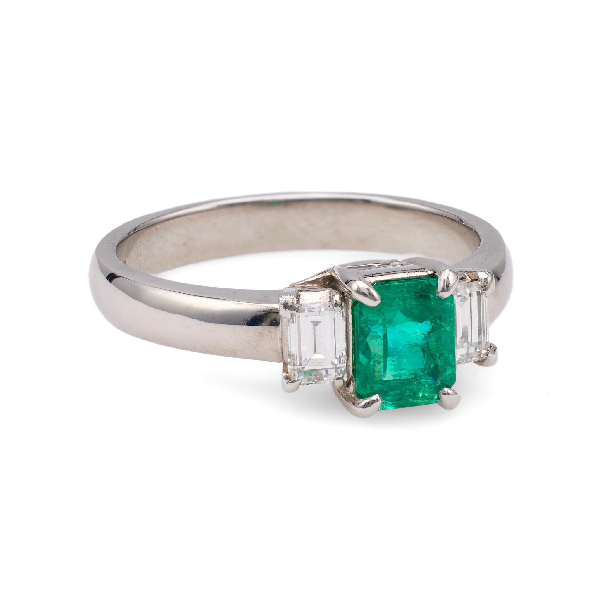 Vintage 0.69 Carat Emerald and Diamond Platinum Three Stone Ring In Excellent Condition For Sale In Beverly Hills, CA
