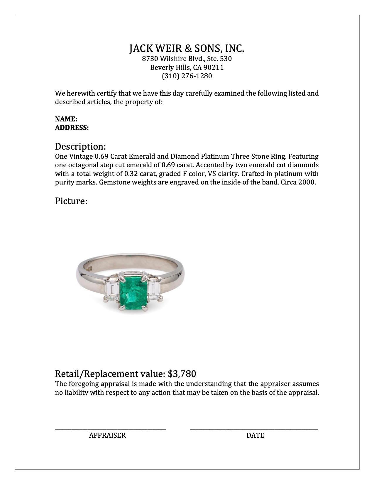 Women's or Men's Vintage 0.69 Carat Emerald and Diamond Platinum Three Stone Ring For Sale