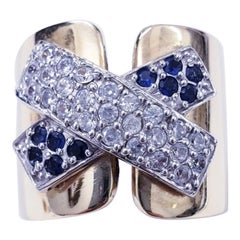 Bague vintage en or 18 carats avec diamants et saphirs bleus