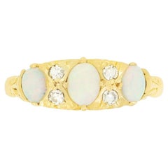 Vintage 0.70ct Opal and Diamond Three Stone Ring, hallmarked1961