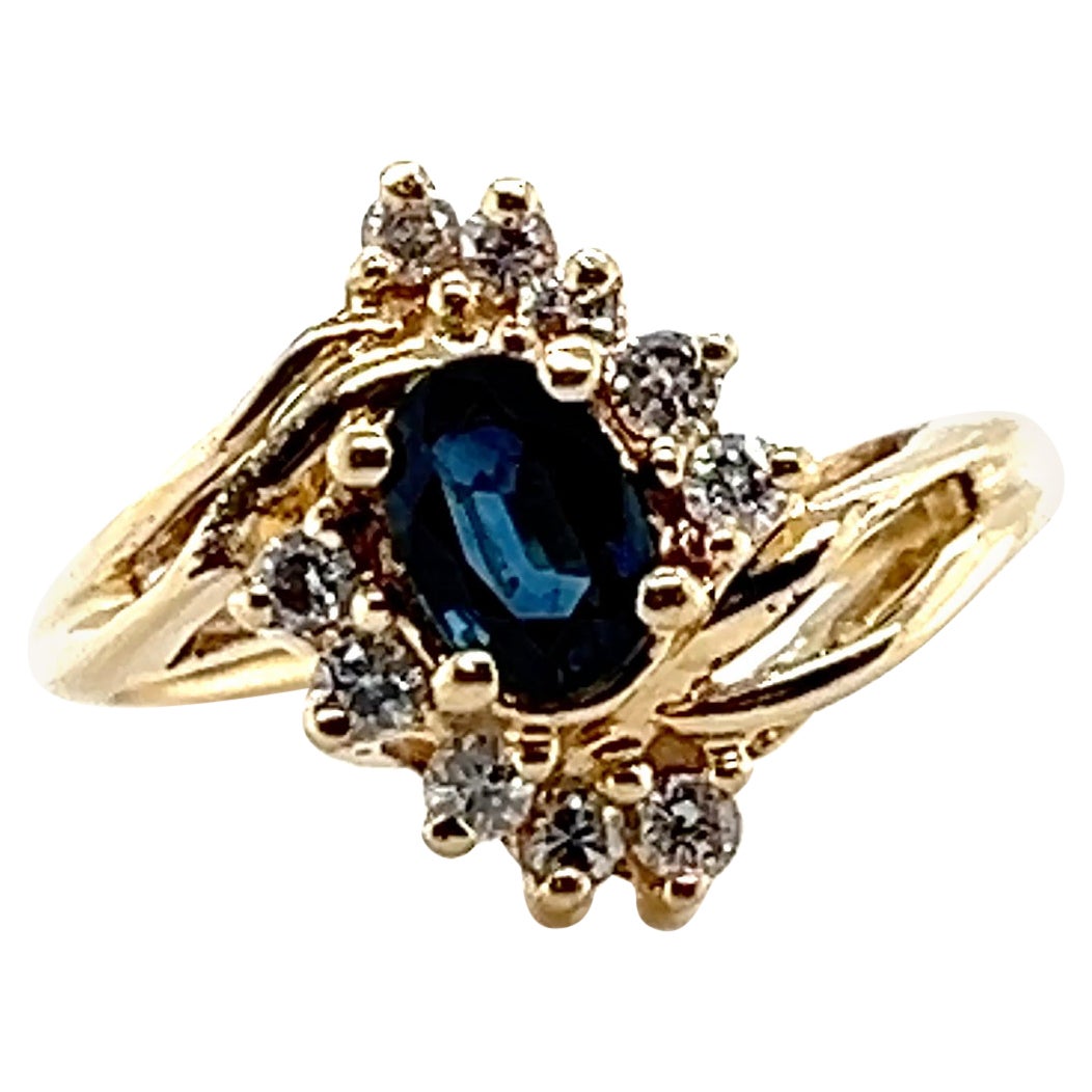Vintage-Clusterring aus 14-karätigem Gelbgold mit einem Saphir von 0,73 Karat und Diamanten, 1980er Jahre