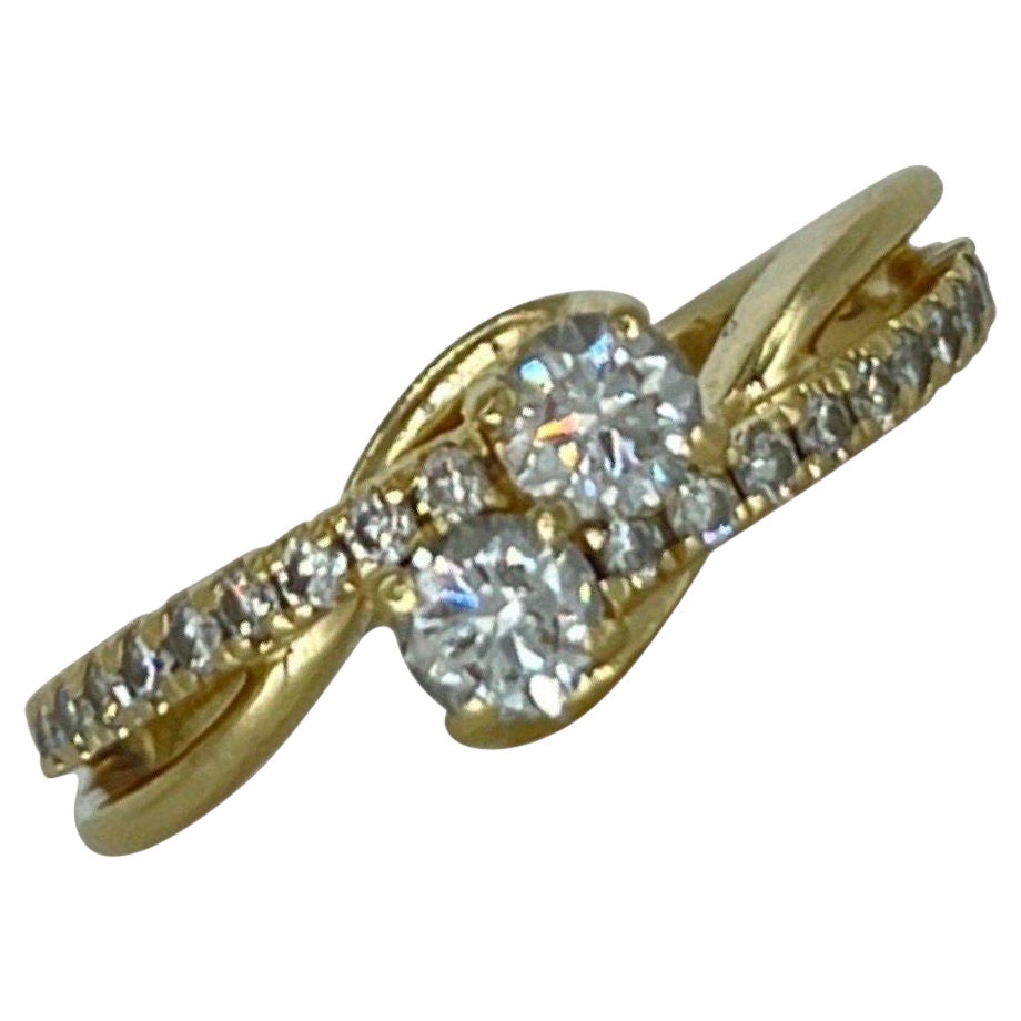 Bague vintage à motifs imbriqués en or 14 carats avec diamants 0,75 carat en vente