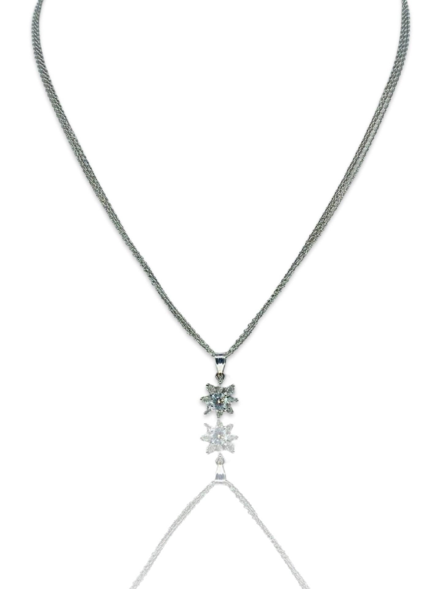 Vintage 0.75 Carat Diamonds Marquise Leaf Floral Pendant Necklace 18k White Gold. The center round brilliant cut Diamond weights 0.25 carat H/VS with the additional surrounding marquise cut diamonds weighting approx 0.50tcw J/SI for a total of 0.75