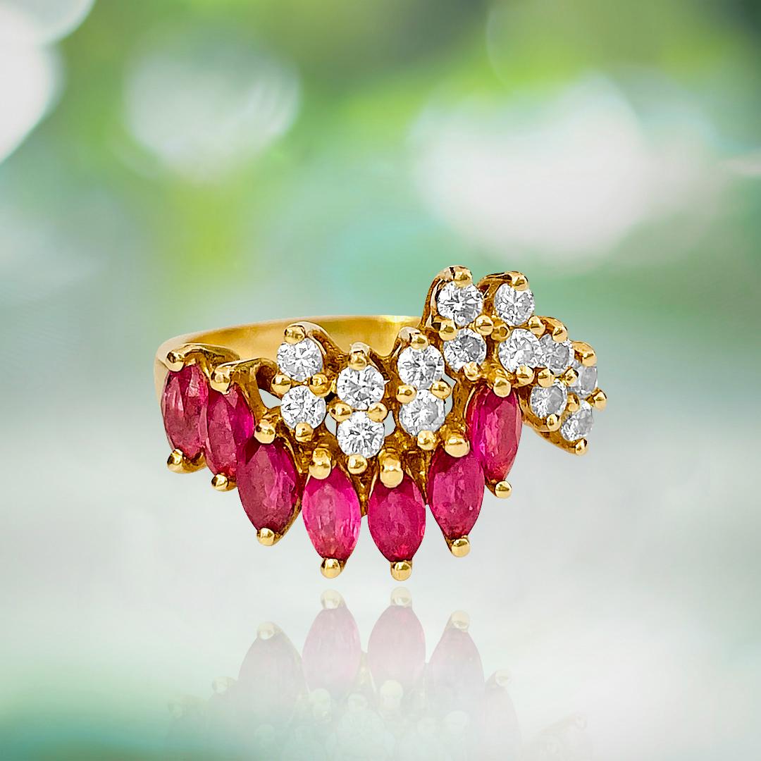 Metal: 14k yellow gold. 
0.40 carat diamond total. VS-SI clarity and F-G color. Round brilliant cut diamonds. 
0.35ct ruby. Marquise cut ruby set in prongs. 
Ring size: US 6.75. Free ring resizing available. 
All precious gemstones are 100% natural