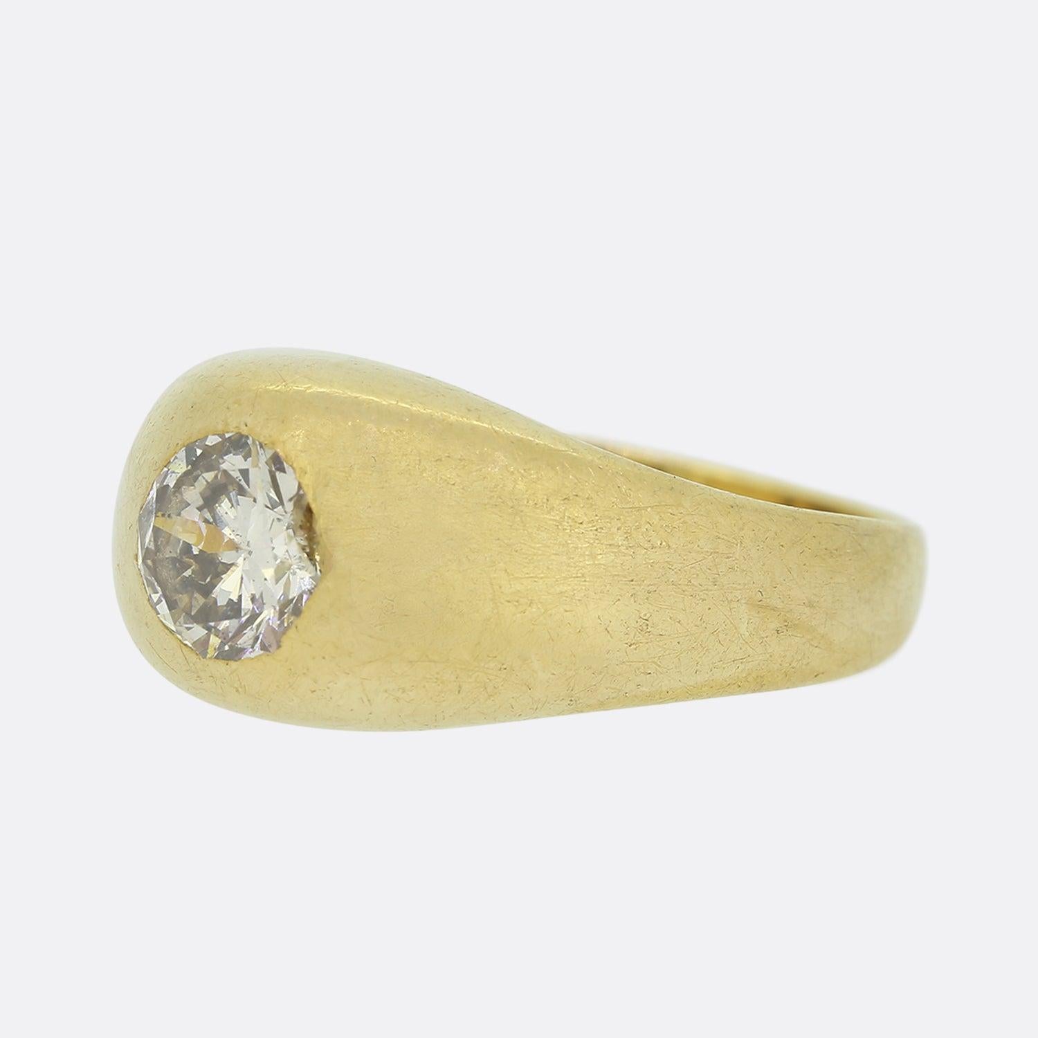 This is an 18ct yellow gold vintage diamond gypsy ring. The central diamond is flush set in a rub-over mount. 

Condition: Used (Very Good)
Weight: 9.5 grams
Size: R (59)
Band Width: 10mm (at the front) - 2.5mm (at the back)
Diamond Carat Weight: