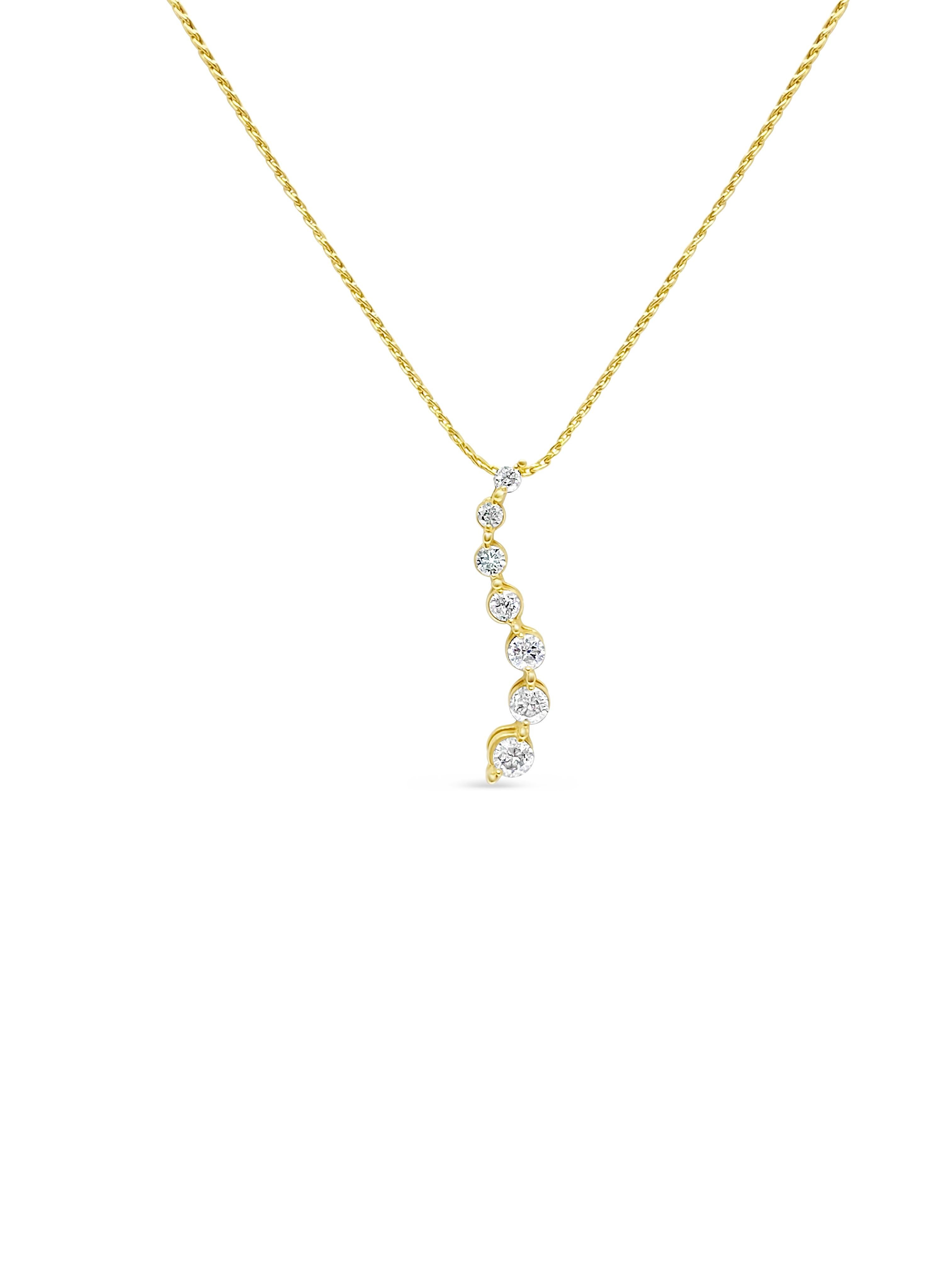 Crafted from 14k yellow gold, this elegant pendant necklace features a total of 0.80 carats of natural earth-mined diamonds. With VS clarity and F-G color, the diamonds exhibit exceptional brilliance and quality. The pendant comes with a 20