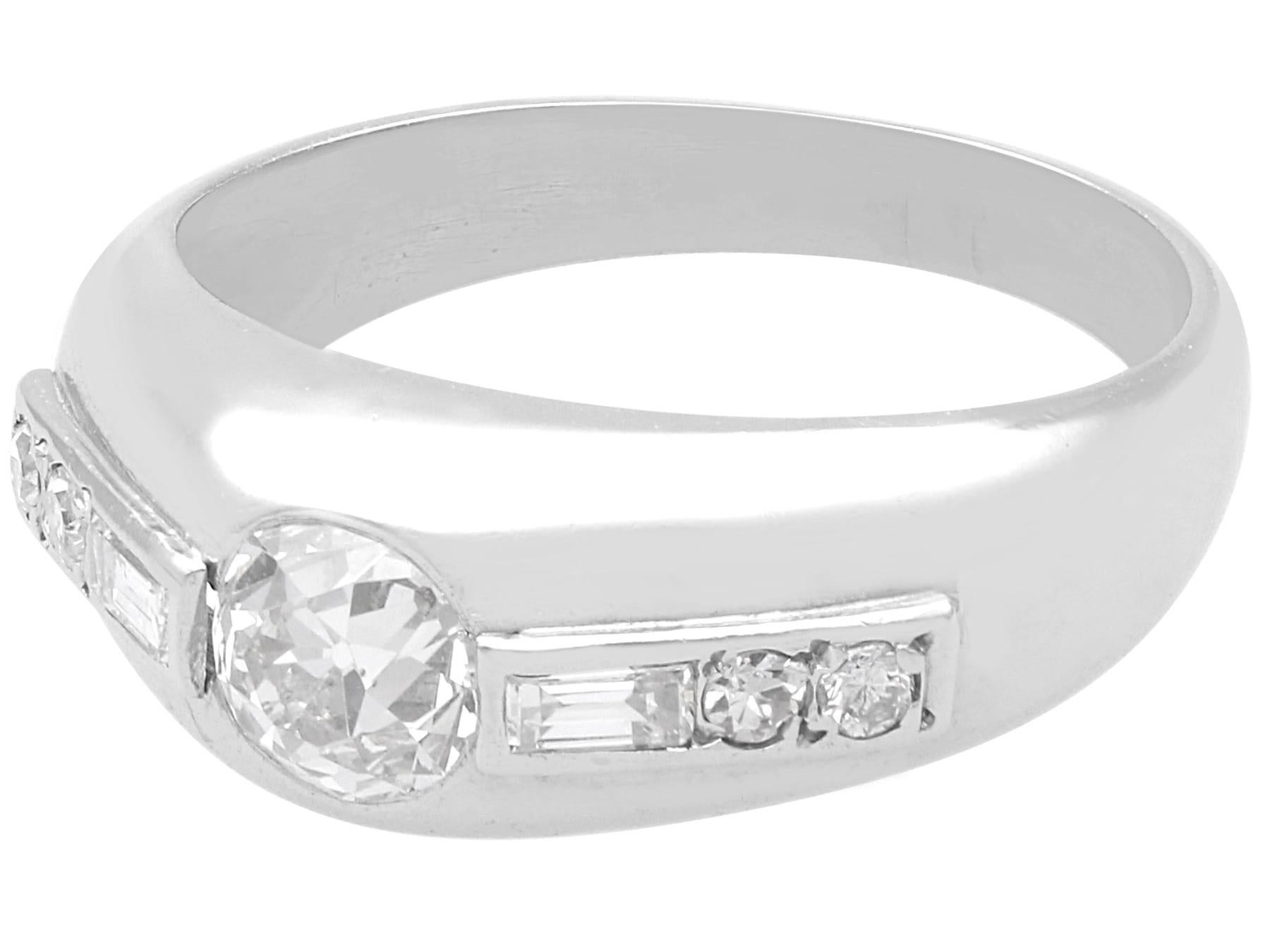 A stunning, fine and impressive vintage 0.82 carat diamond and platinum ring; part of our diverse diamond jewelry collection.

This stunning, fine and impressive vintage engagement ring has been crafted in platinum.

The plain graduating band