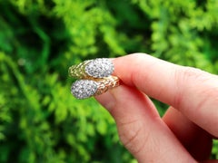 Vintage 0.83 Carat Diamond and 18K Yellow Gold Twist Ring