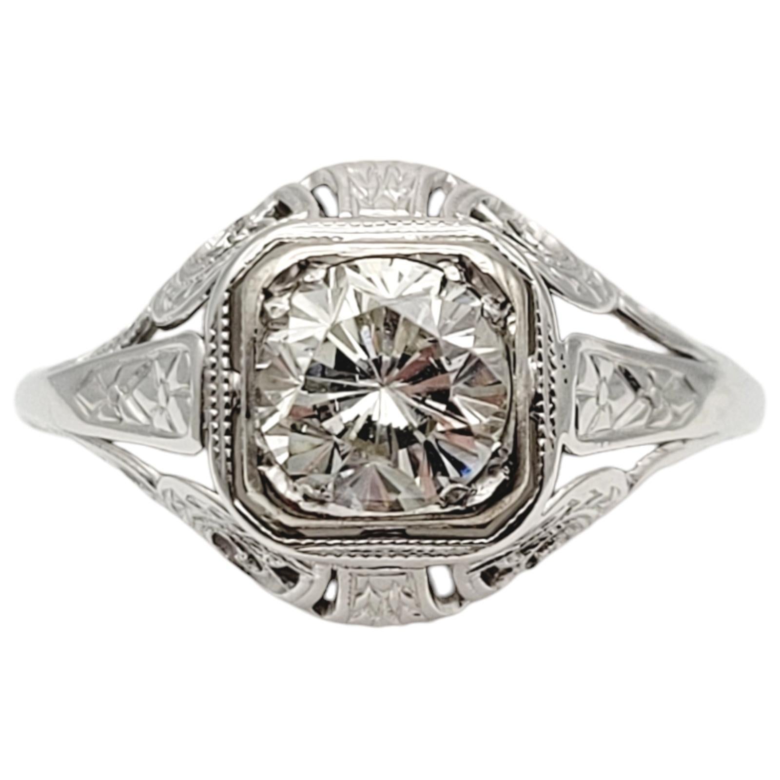 Ring Size: 6.25

Introducing a stunning Vintage Early Modern Cut Solitaire Diamond Engagement Ring. This exquisite piece combines timeless elegance with a touch of vintage allure. With its classic design and exceptional diamond, this ring symbolizes