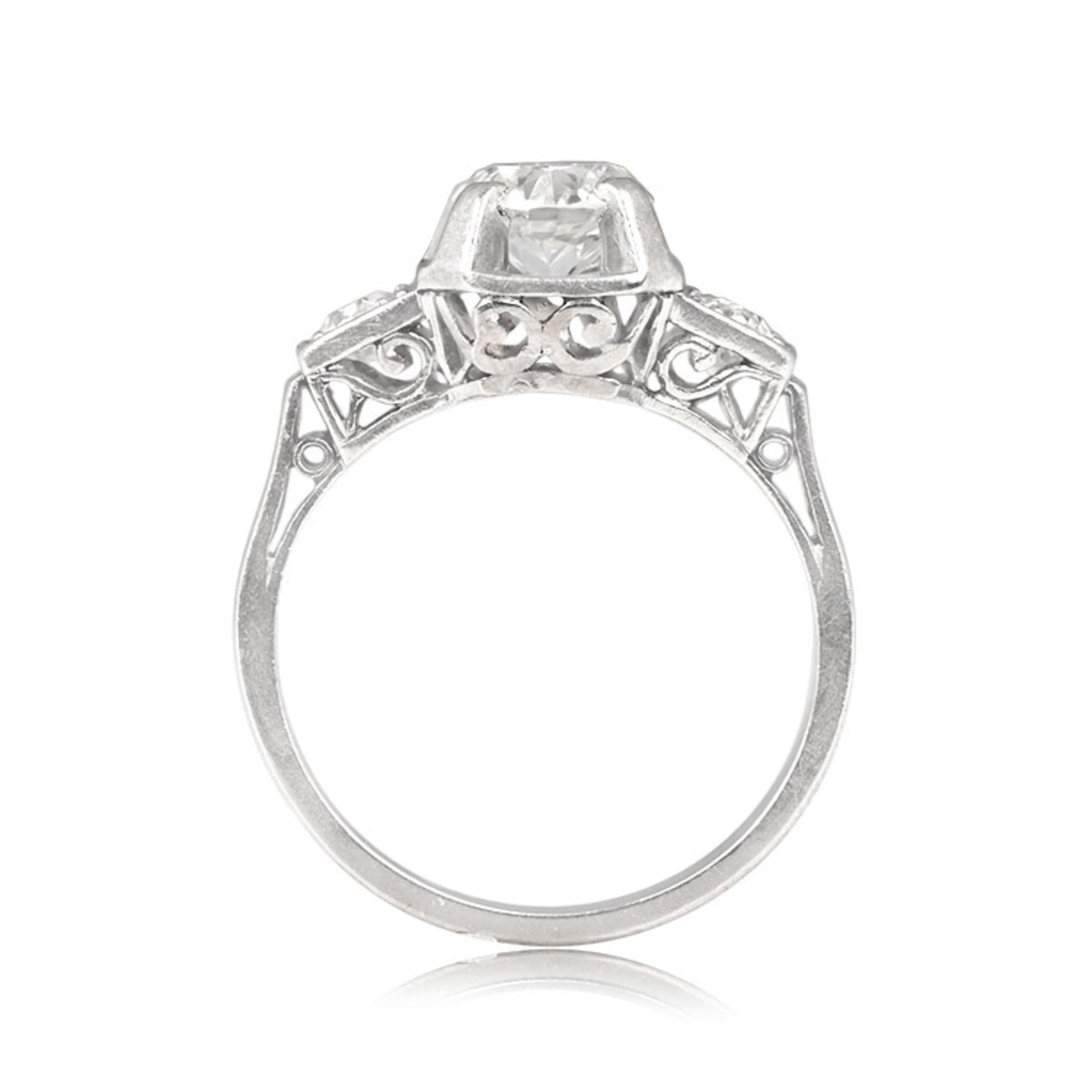An exquisite French Art Deco platinum ring showcases a 0.85-carat old European cut diamond in prongs. The J color, VS1 clarity center diamond is accented by single-cut diamonds on the shoulders. The open-work under-gallery adds intricate detail.