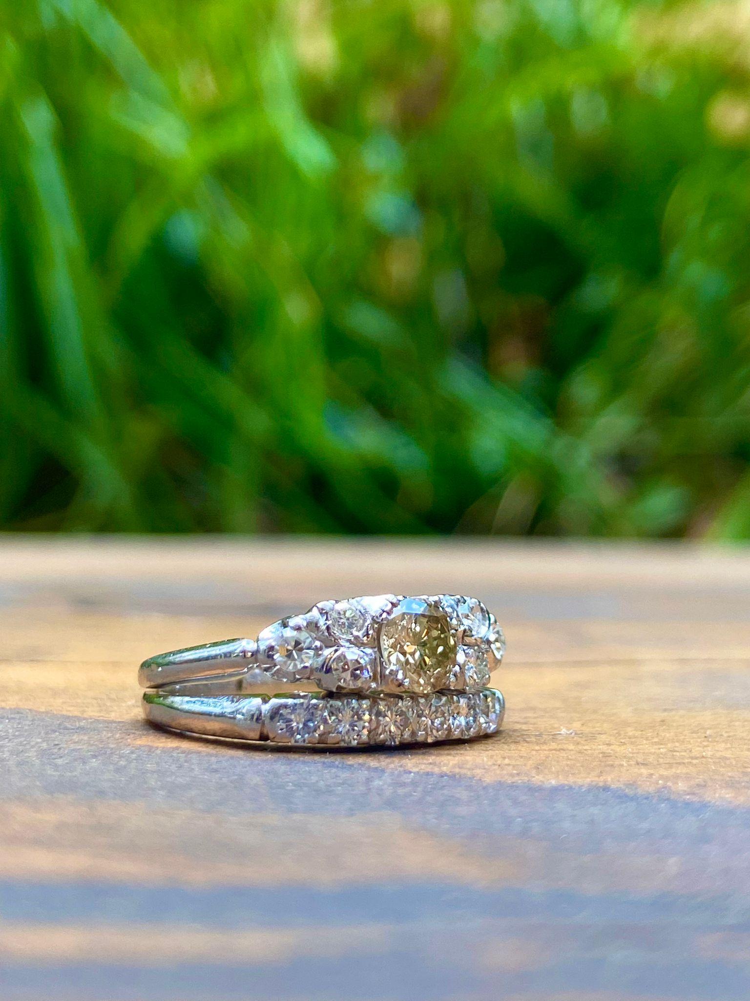 A Stunning Mid-Century Estate Vintage Round Shaped Diamond Ring from our Estate Collection - is actually comprised of a two-piece wedding set... Original vintage wedding sets are hard to find and this bright and splashy Platinum and diamond set from