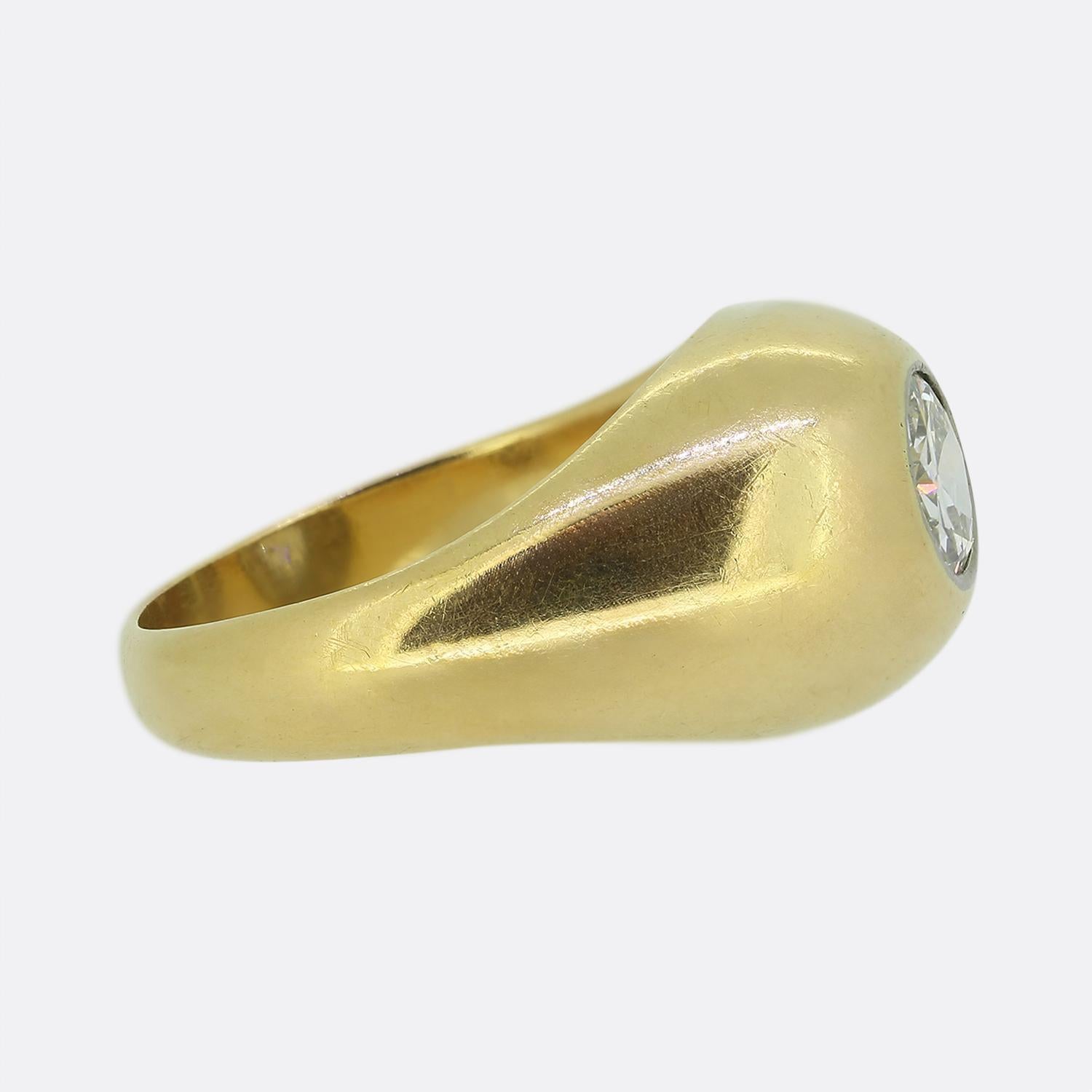 Here we have a classic 18ct yellow gold vintage diamond gypsy ring. A single round transitional cut diamond has been rub-over set at the centre of the face. The ring is an impressive 11.8 grams and is suitable for both men and woman.

Condition: