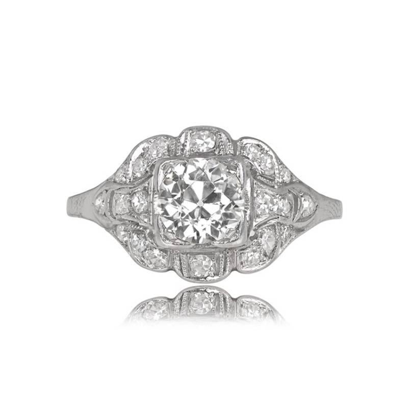 An original Art Deco engagement ring with an approximately 0.92-carat old European cut diamond, H color, and VS2 clarity. The vintage piece highlights a halo of single-cut diamonds around the center stone and along the shoulders, totaling