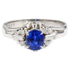 Vintage 0.97 Carat Oval Blue Sapphire & Diamond Filigree in Platinum Floral Ring