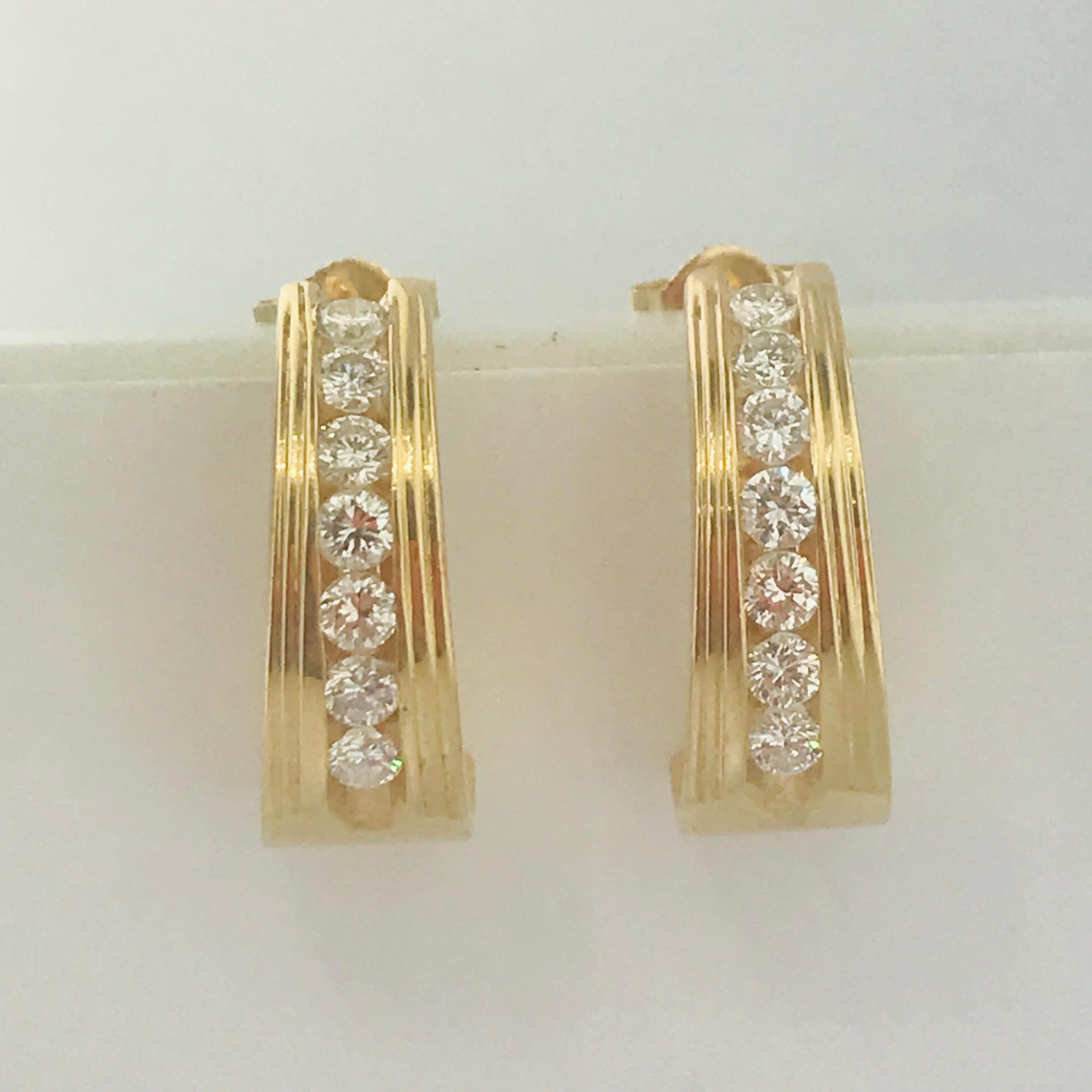 18kt yellow gold 1.00ct diamond oval huggie earrings