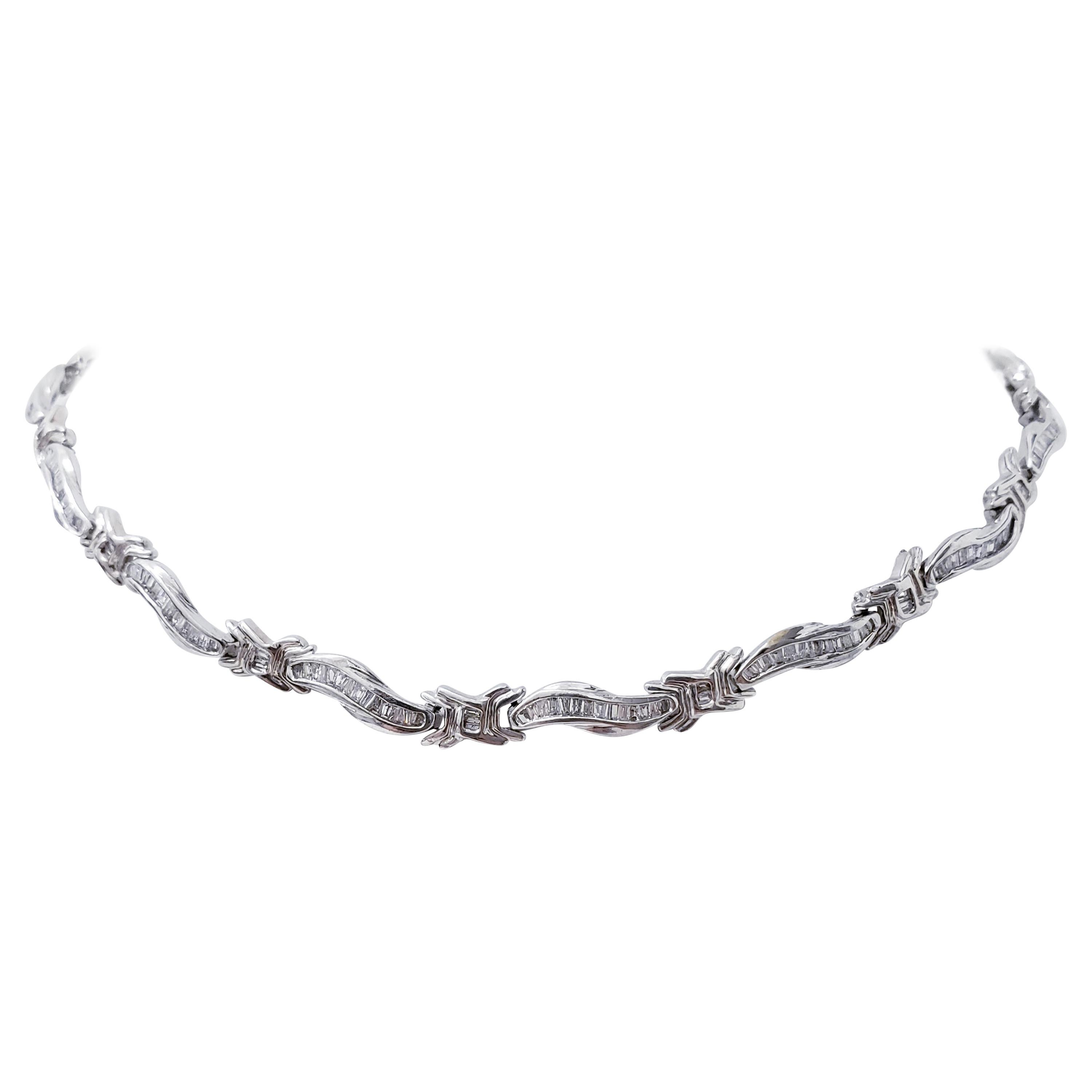Vintage 10 Carats Baguette Diamonds Necklace Choker. Beautifully put together with X design every link. The diamonds approx weight 10 carats in 14k solid white gold. The Length of this necklace is 15 inches and the height of the link is 6mm. The