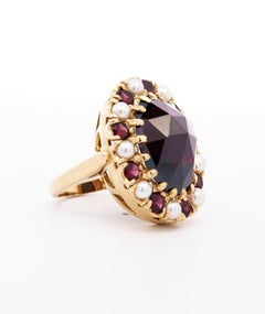 Vintage 10 Carat Oval Cut Garnet and Pearl Halo 14K Yellow Gold Cocktail Ring