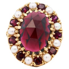 Retro 10 Carat Oval Cut Garnet and Pearl Halo 14K Yellow Gold Cocktail Ring