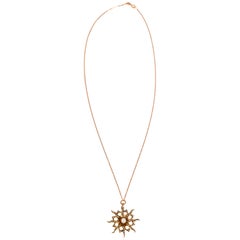 Antique 10 Karat Rose Gold Starburst Pendant with Seed Pearls