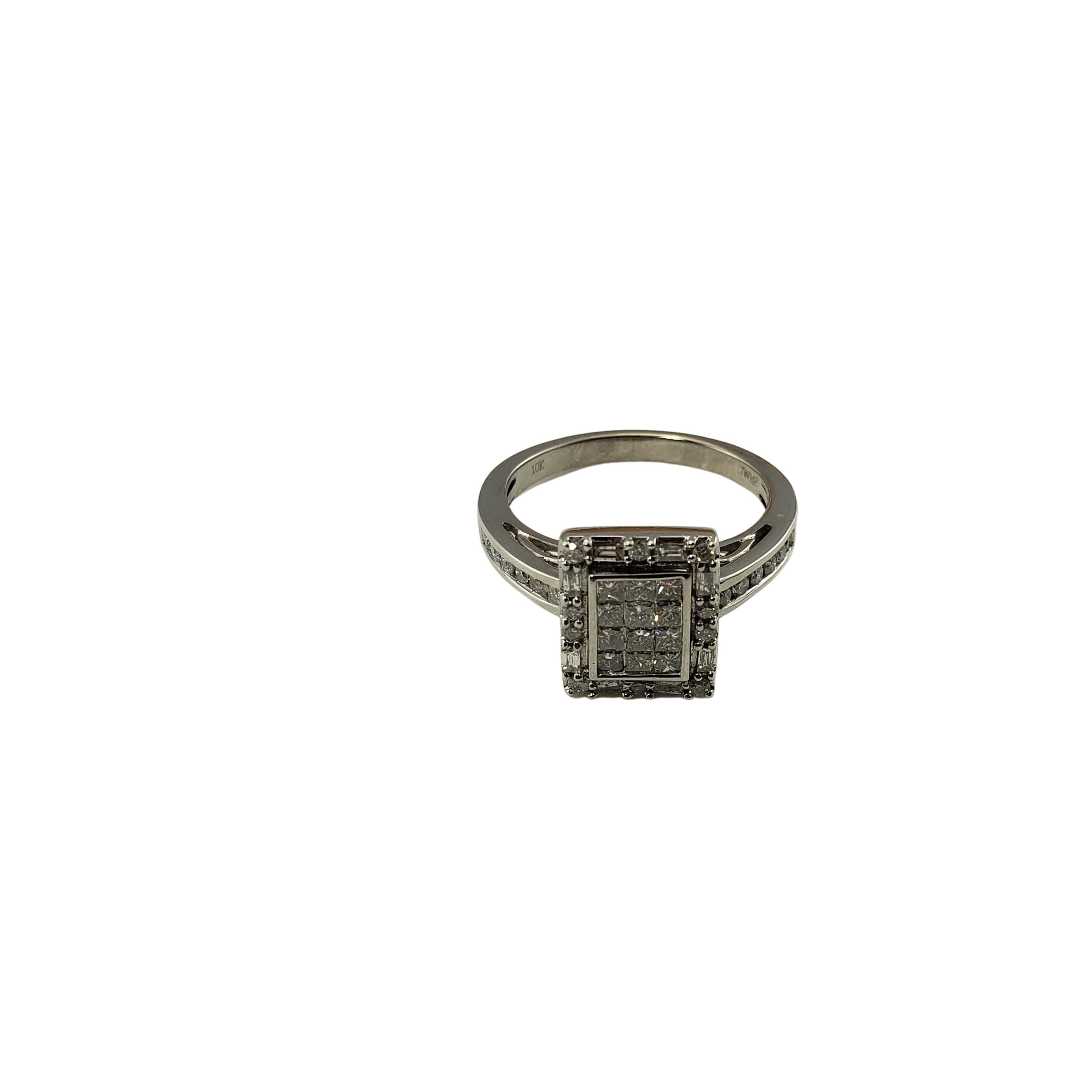 Vintage 10 Karat White Gold and Diamond Ring Size 7-

This sparkling ring features 12 princess cut diamonds, 18 round brilliant cut diamonds and eight baguette diamonds set in classic 10K white gold.  Top of ring measures 11 mm x 9 mm.  Shank:  2