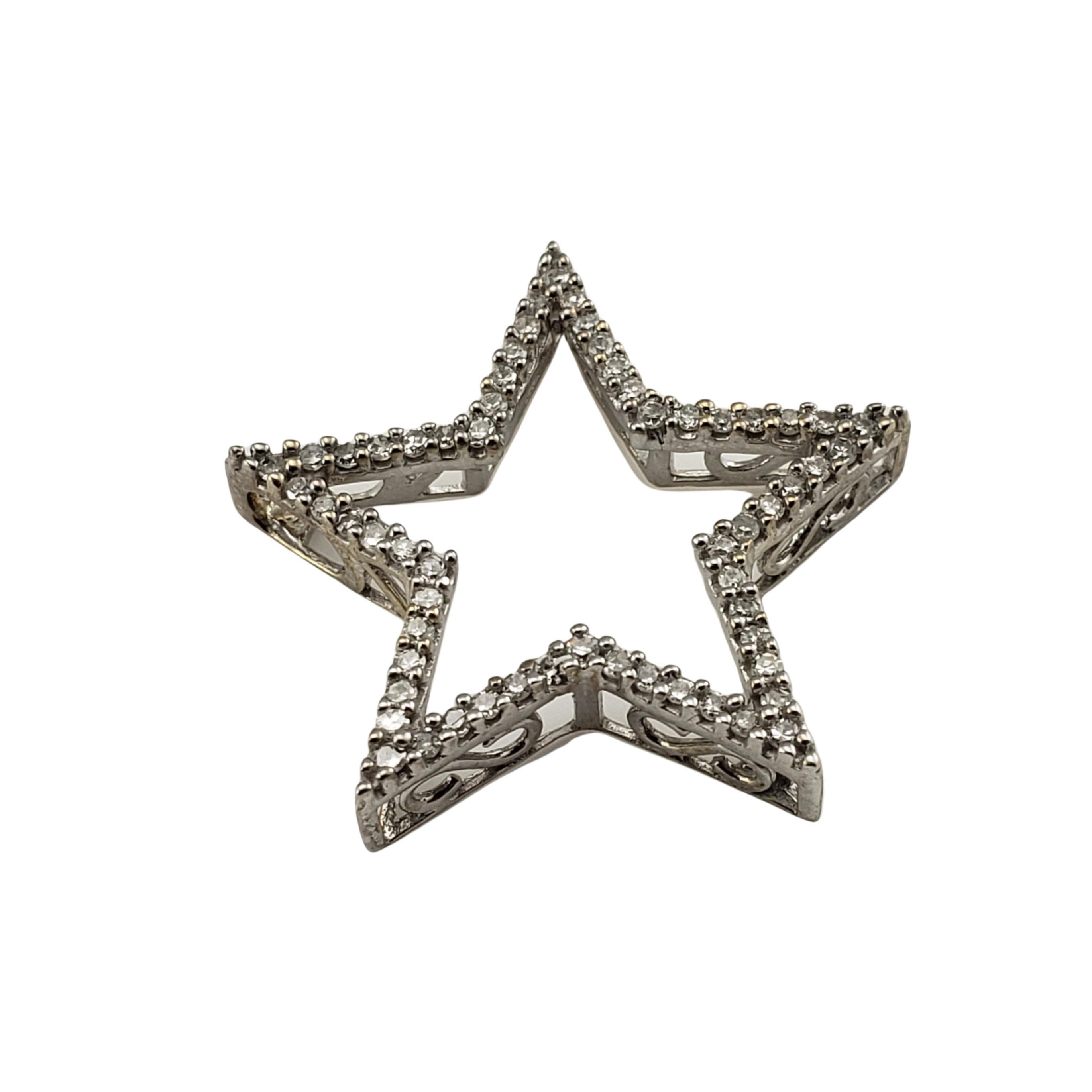 Vintage 10 Karat White Gold and Diamond Star Pendant-

This sparkling star pendant features 59 round single cut diamonds set in classic 10K white gold.  

Approximate total diamond weight:  .30 ct.

Diamond color:  J-K

Diamond clarity:  I1

Size: