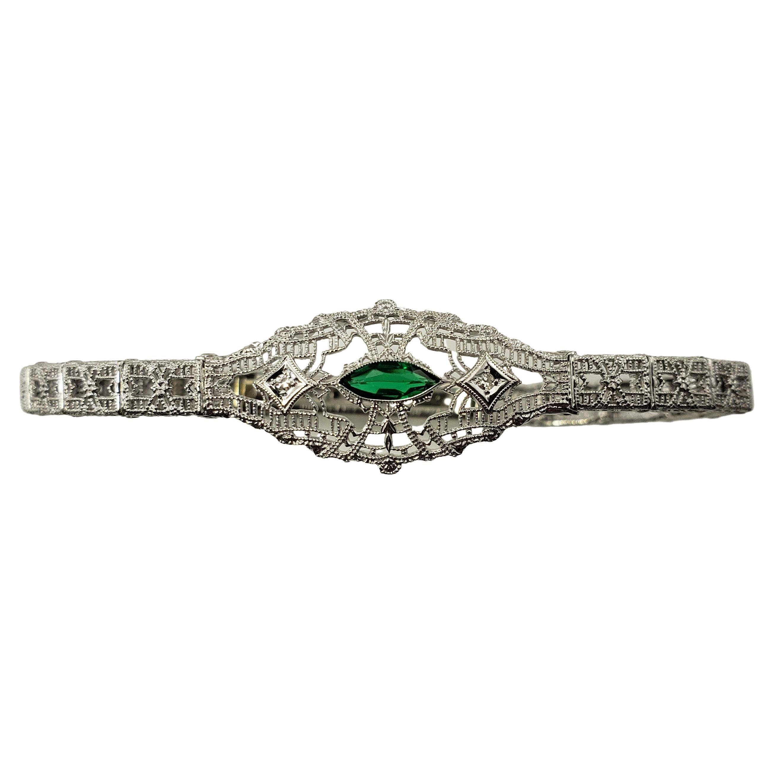 Vintage 10 Karat White Gold Filigree, Diamond and Simulated Emerald Bracelet