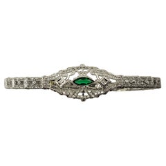 Vintage 10 Karat White Gold Filigree, Diamond and Simulated Emerald Bracelet