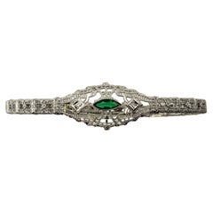 Bracciale vintage in oro bianco 10 carati con filigrana, diamanti e smeraldo simulato