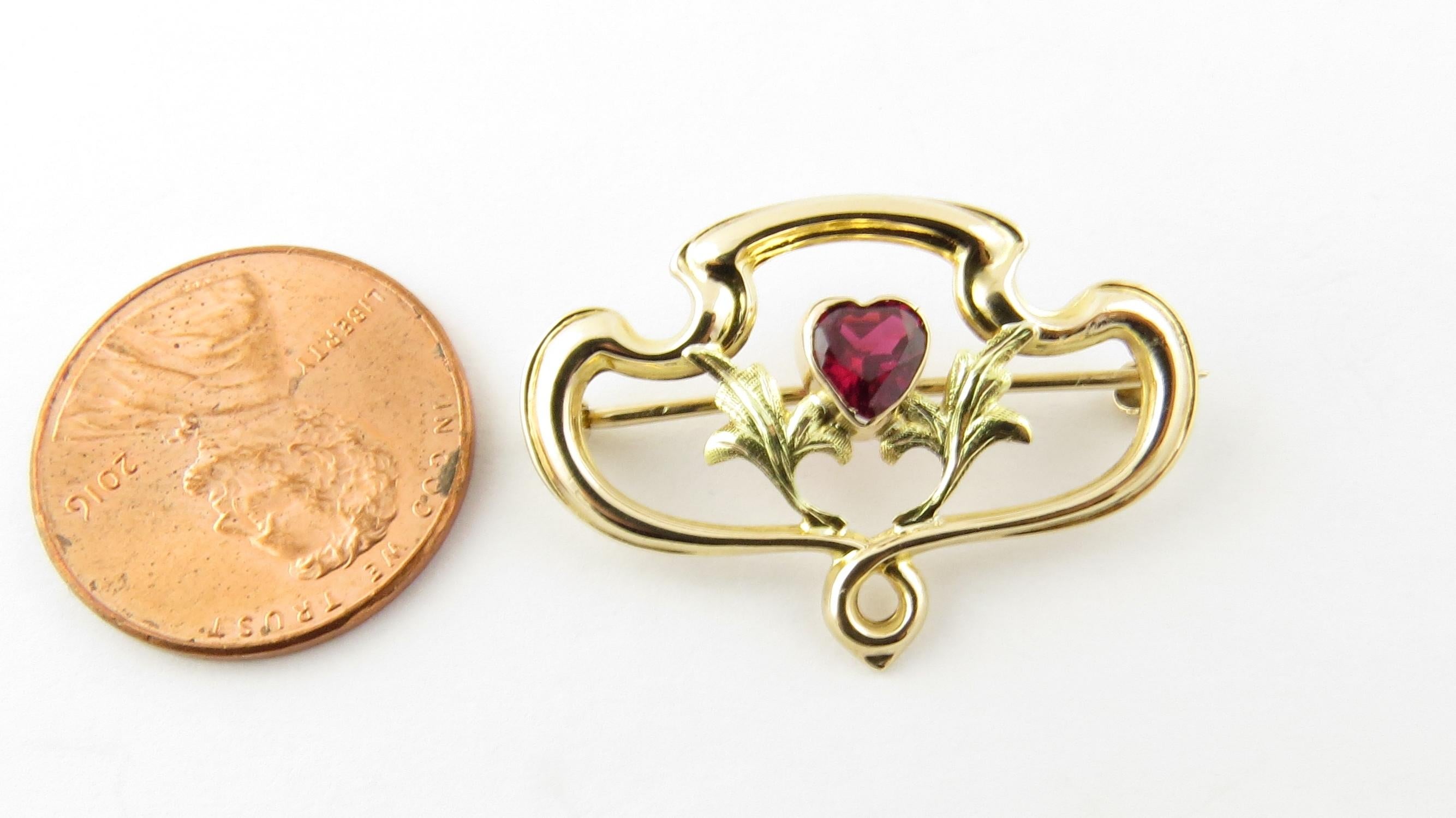 Vintage 10 Karat Yellow Gold and Synthetic Ruby Brooch/Pin

This lovely brooch features one heart shaped synthetic ruby (6 mm x 5 mm) set in beautifully detailed 10K yellow gold.

Size: 20 mm x 30 mm

Weight: 1.0 dwt. / 1.6 gr. Stamped: 10K

Very