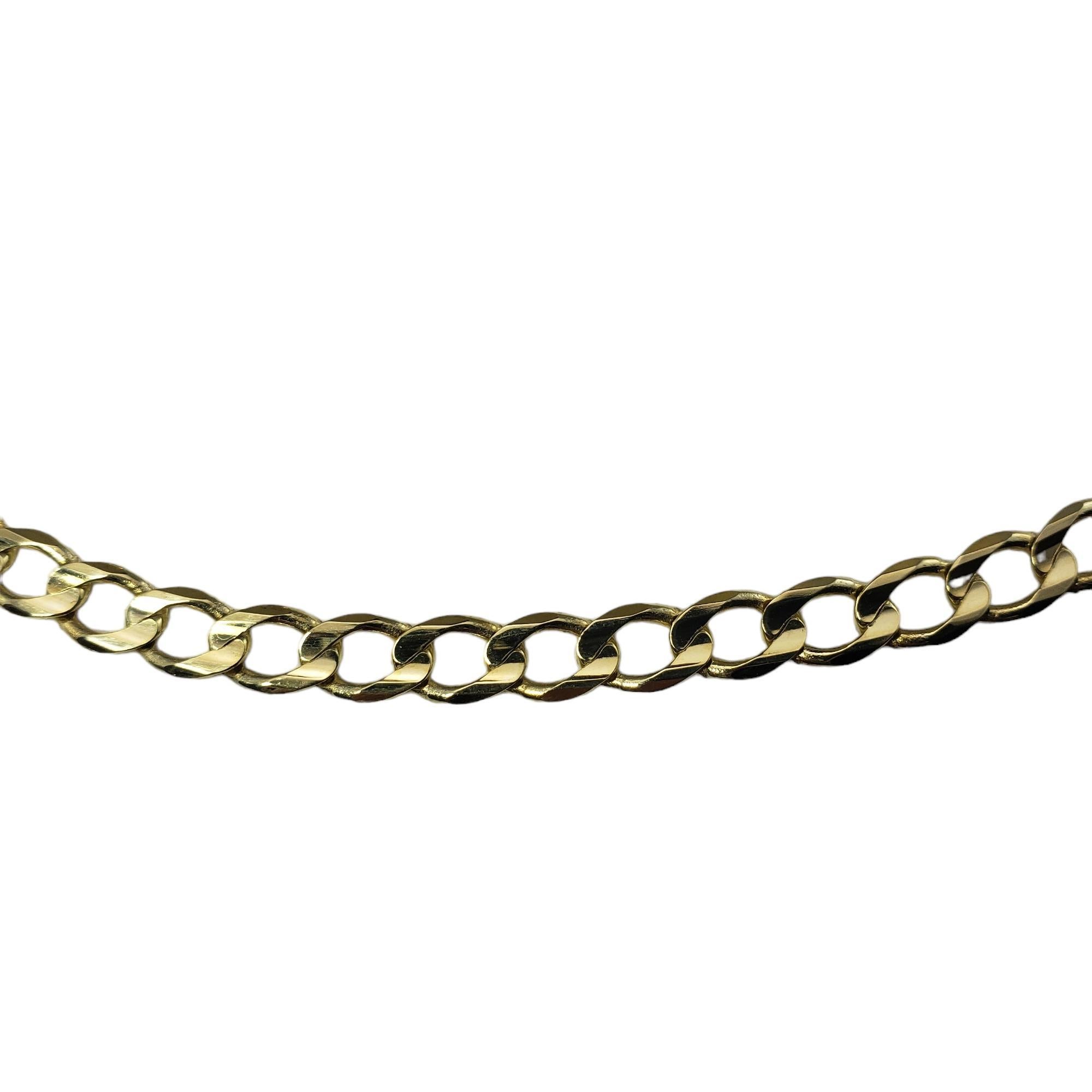 Vintage 10 Karat Yellow Gold Curb Chain Necklace-

This elegant curb chain necklace is crafted in beautifully detailed 10K yellow gold.  Width: 5 mm.

Size: 20 inches

Weight:  13.8 gr./  8.8 dwt.

Stamped: MIDAS 10K  TURKEY

Very good condition,