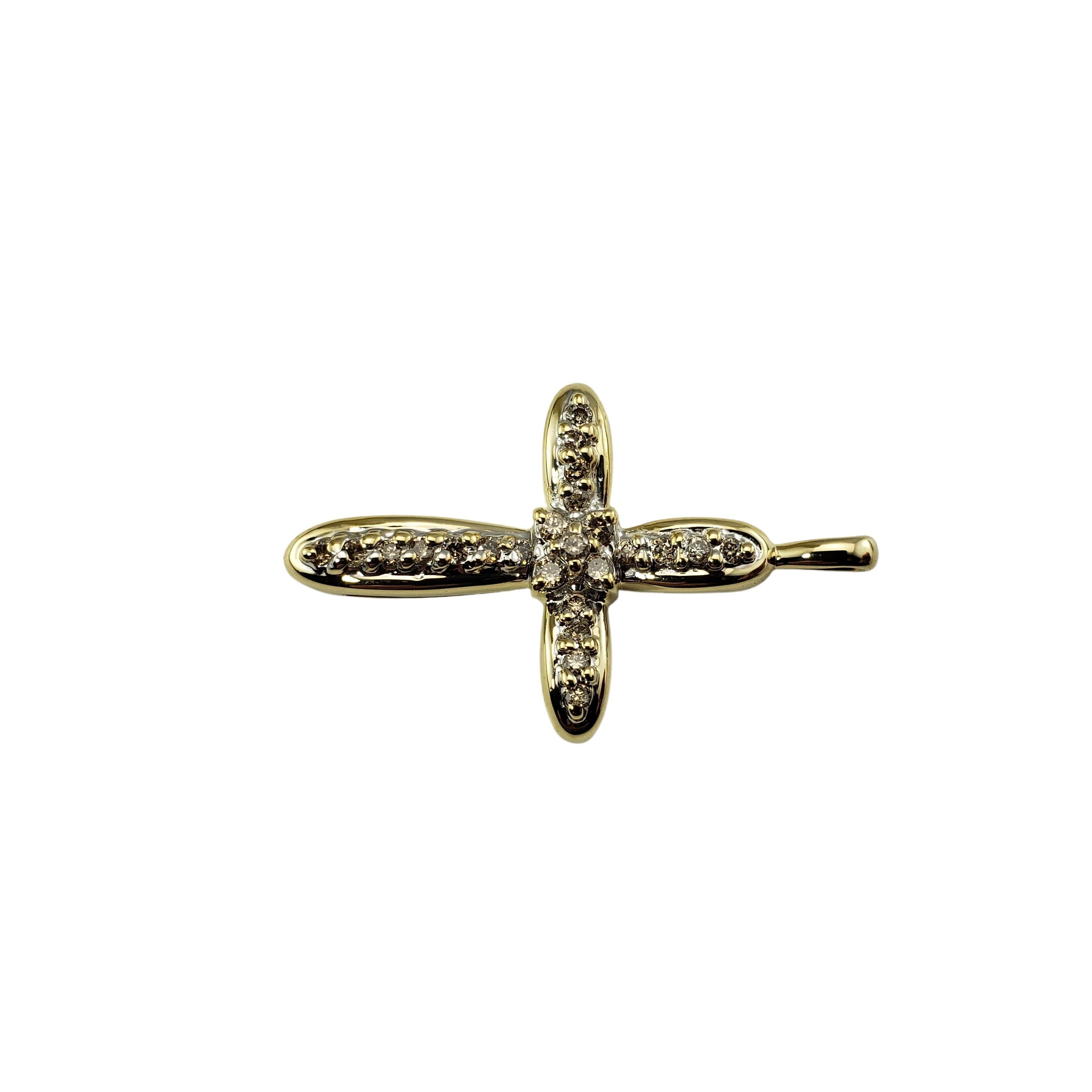 Vintage 10 Karat Yellow Gold and Diamond Cross Pendant-

This lovely cross pendant features 24 round brilliant cut diamonds set in classic 10K yellow gold.

Approximate total diamond weight:  .14 ct.

Diamond color:  L-N

Diamond clarity: 