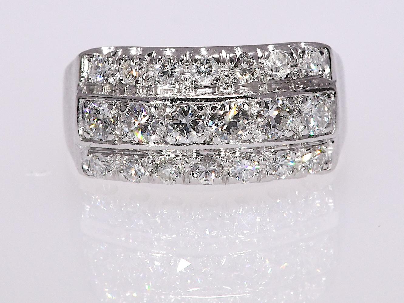 1.0 TCW Natural Diamond Triple Row Ring set in Platinum 7.60 gram 

Stone: Natural Diamond    TCW: 1   Cut: Round   Color: GH   Clarity: VS1-SI1
Style: Triple Row Ring 
Metal: Platinum 
Finger size is 7 1/2 and can be re sized by our master