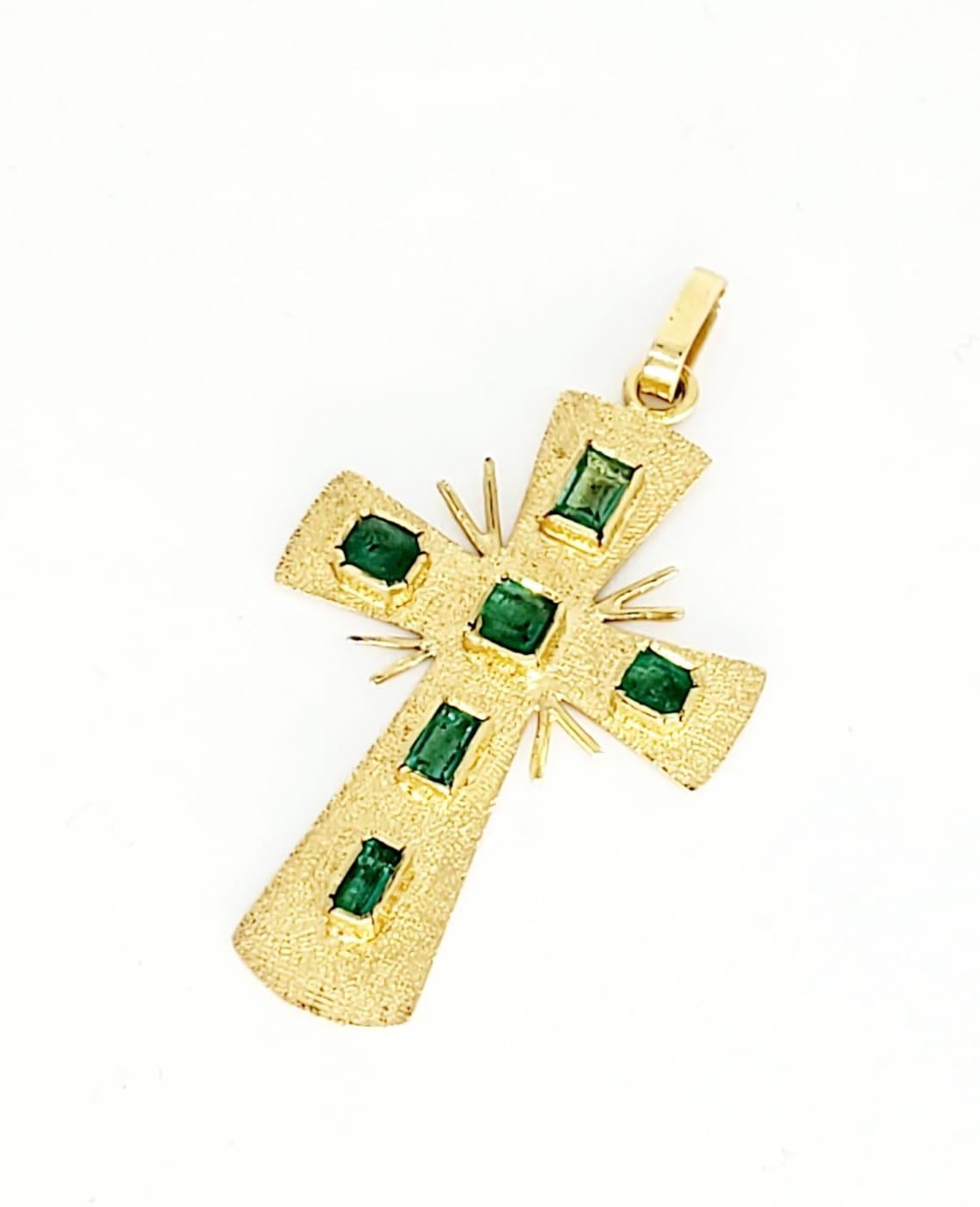 Vintage 1.00 Carat Colombian Emerald 18k Gold Cross Pendant. The pendant measures 2”x1” and weights approx 4.5 grams 18k solid gold.