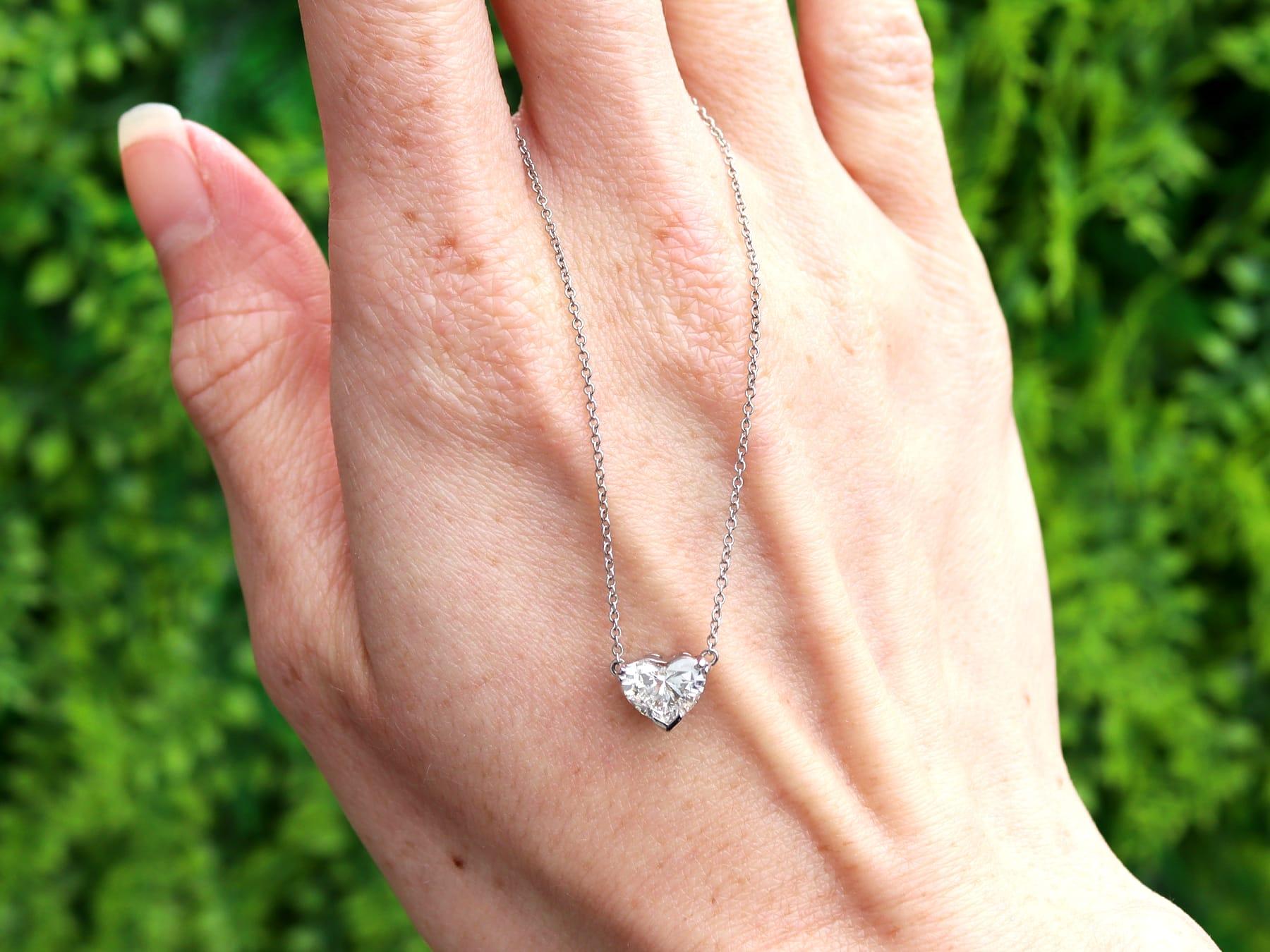 A stunning, fine and impressive 1.00 carat diamond and 18 karat white gold heart cut solitaire pendant; part of our collection of vintage diamond jewelry.

This fine and impressive diamond necklace has been crafted in 18k white gold.

The pierced