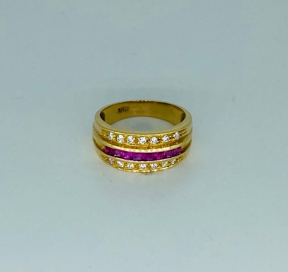 Vintage 1.00 Carat Diamonds & Ruby Band Ring 18k Gold. Very high quality ring featuring approx 1 carat of rubies and fine diamonds. The ring is a size 6.5 and is made in 18k solid gold. Weights 4.9 grams.