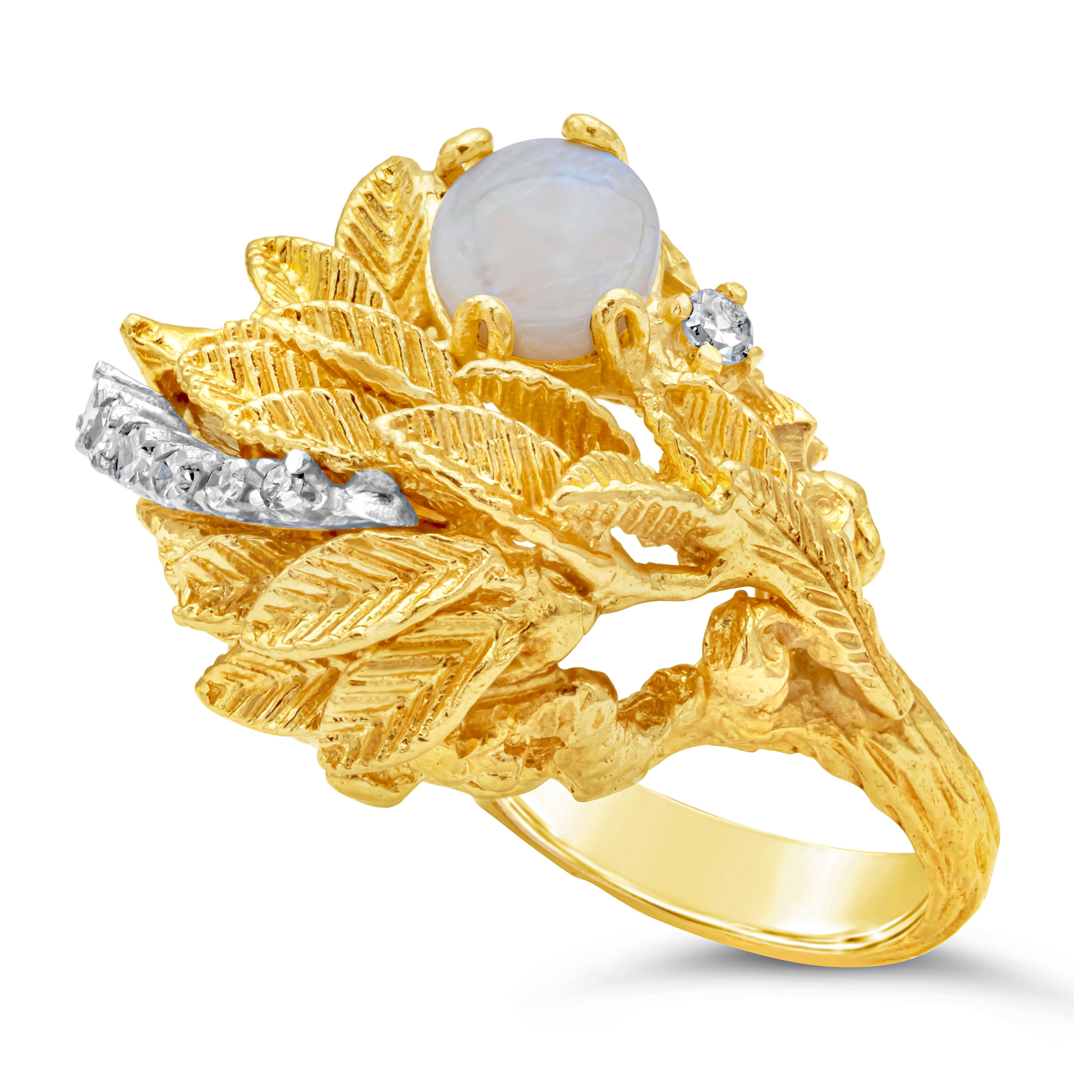 This artistic and stylish fashion ring features single cut diamonds weighing 0.15 carats total, G color, SI in clarity and a vintage white opal weighing 1.00 carats. Beautifully set in a leaf-like design and made in 14k yellow gold.

Style available