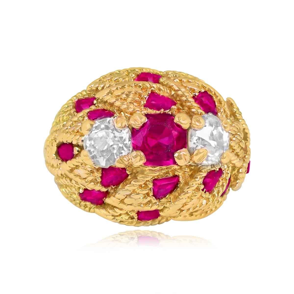 A stunning vintage engagement ring showcasing a natural cushion-cut ruby weighing approximately 1 carat, radiating warmth and elegance. Flanking the center stone are two old European cut diamonds, with a total approximate diamond weight of 0.75