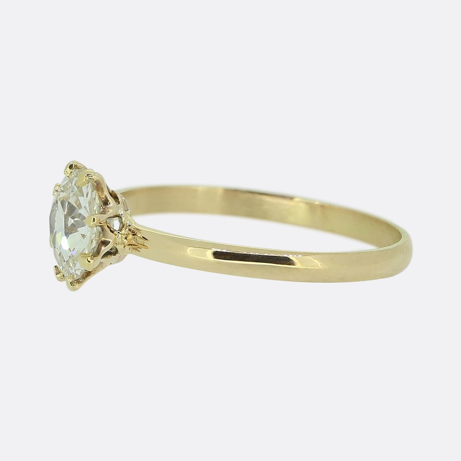 Here we have a gorgeous 18ct yellow gold diamond solitaire ring. This vintage piece showcases a single bright white 1.00ct old European cut diamond in a neat eight-clawed setting. This perfectly sized antique stone sits proud atop a more