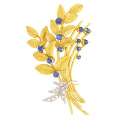 Vintage 1.00 Carat Sapphire and Diamond Floral Brooch, circa 1963